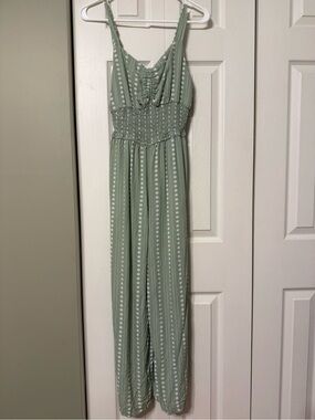 Light Sage Green Smocked Jumpsuit with floral pattern
